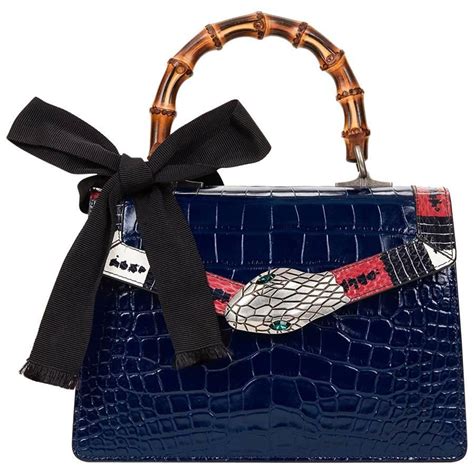 gucci handbag with blue patch work and crocodile pattern|Gucci Crocodile Bags .